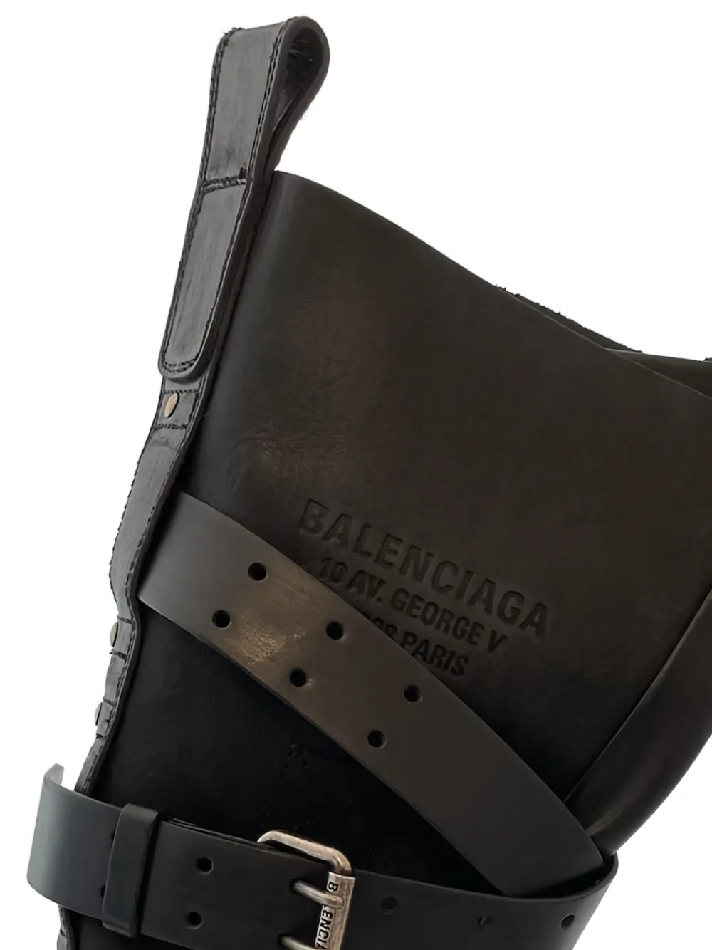 Close up of black boot,showing texture of the leather fabric
