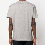 Grey shirt worn by a person, showing the shirt fit