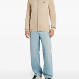 Tan sweater, full body view