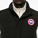Black jacket worn by a person, showing the jacket fit