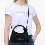 Black bag worn by a person, showing the bag's fit