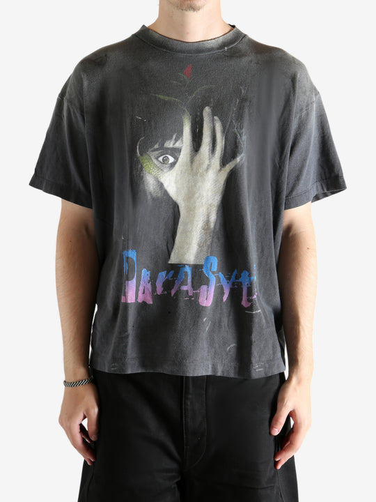 Black t-shirt worn by a person, showing the t-shirt's fit