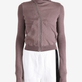 Brown hoodie worn by a person, showing the hoodie fit