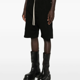 Black shorts worn by a person, showing the shorts fit