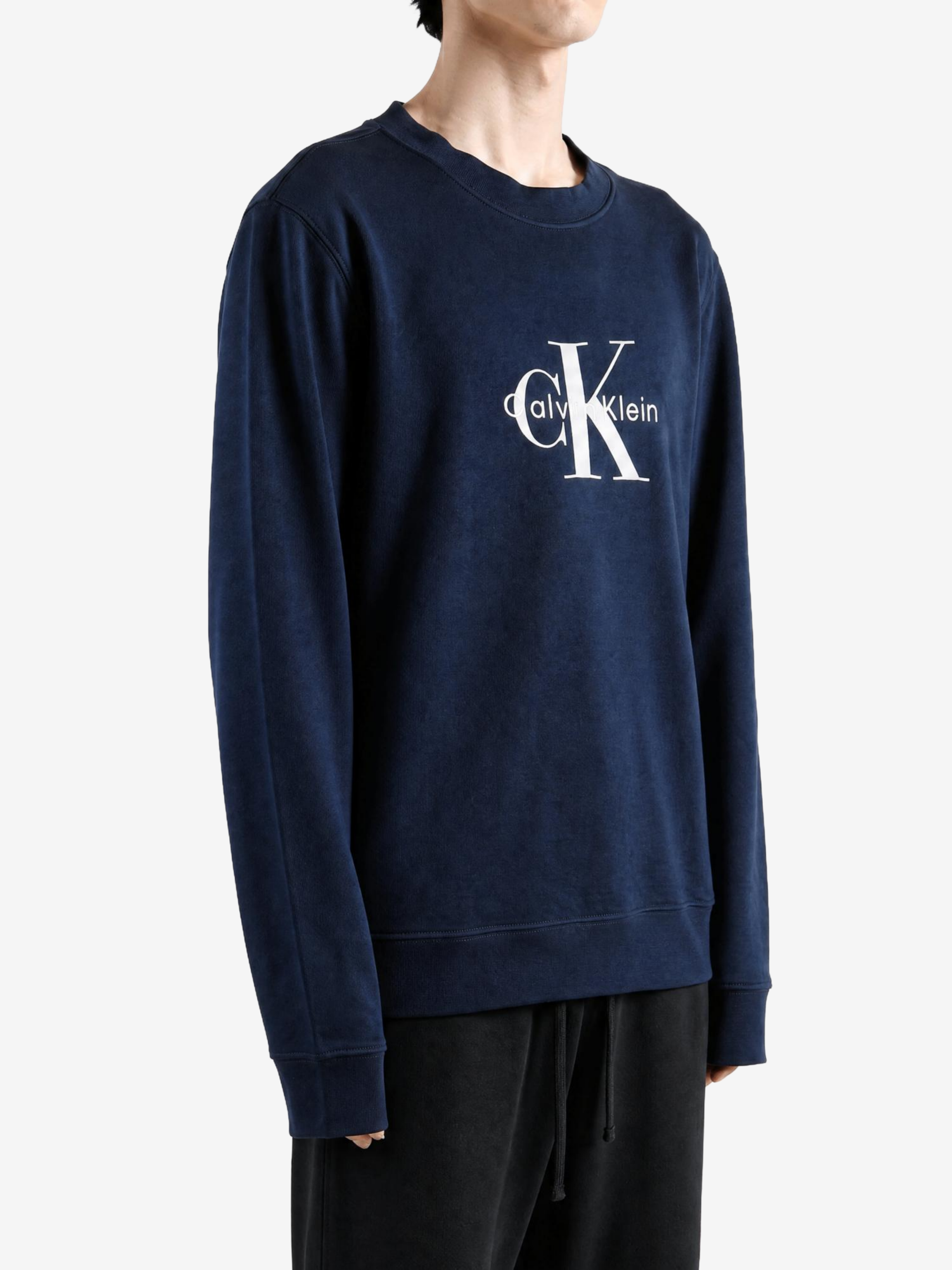 Navy hoodie worn by a person, showing the hoodie fit