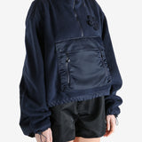 Navy jacket worn by a person, showing the jacket's fit