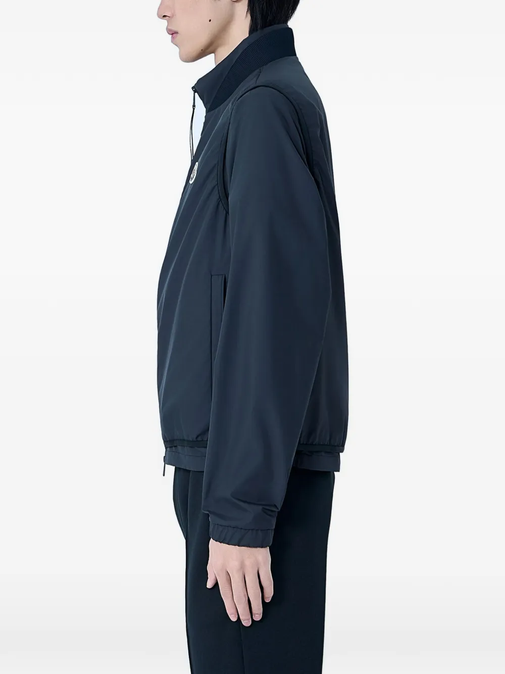 blue jackets-coats worn by a person,show the jackets-coats fit