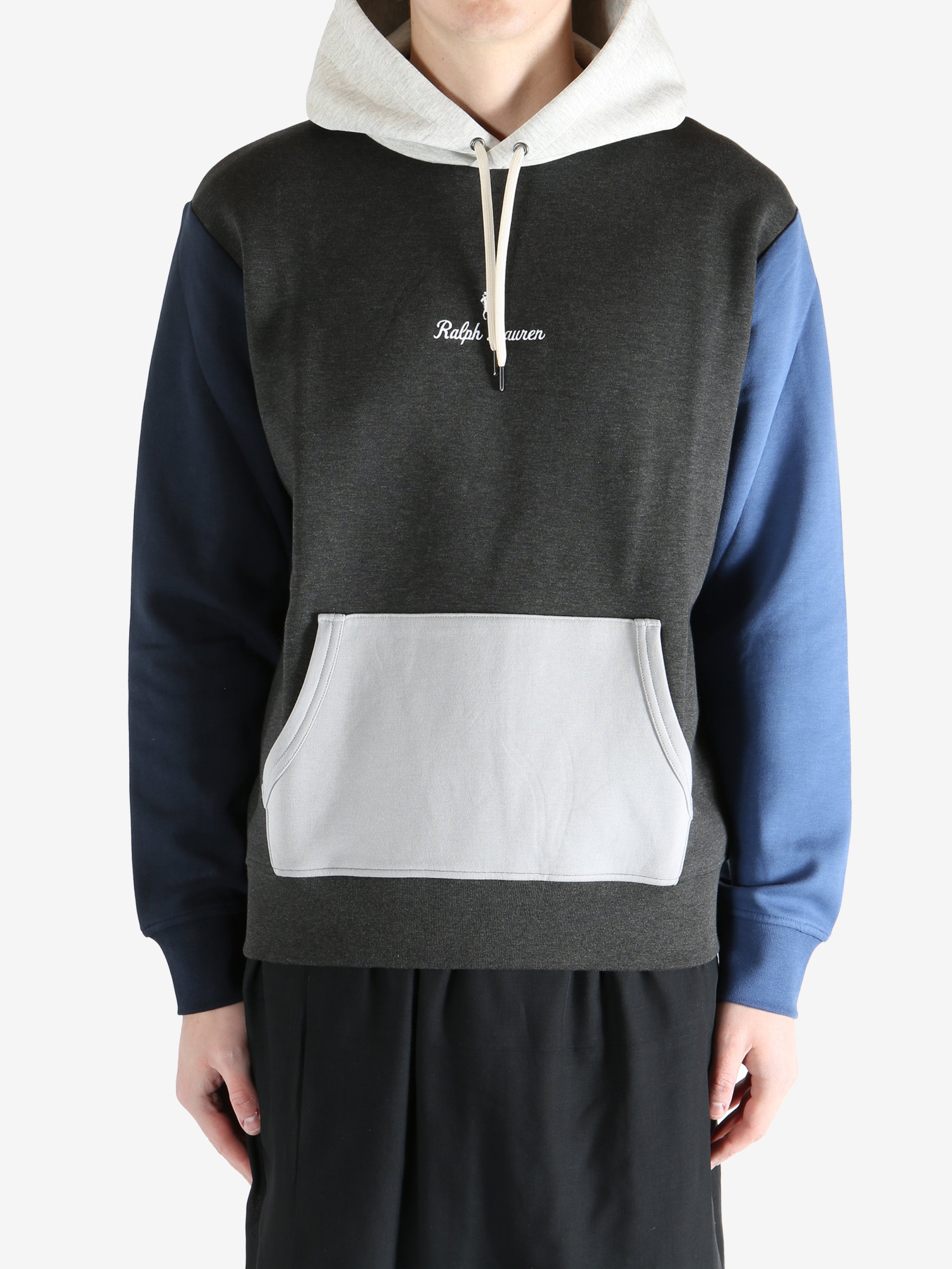 Color-blocked hoodie worn by a person, showing the hoodie fit