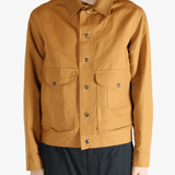 Brown jackets worn by a person, showing the jacket's fit 