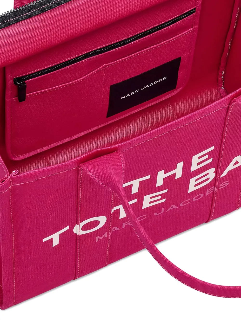 Close up of pink bag, showing texture of the cotton fabric