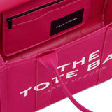 Close up of pink bag, showing texture of the cotton fabric