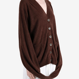 Brown knitwear worn by a person, showing the knitwear fit