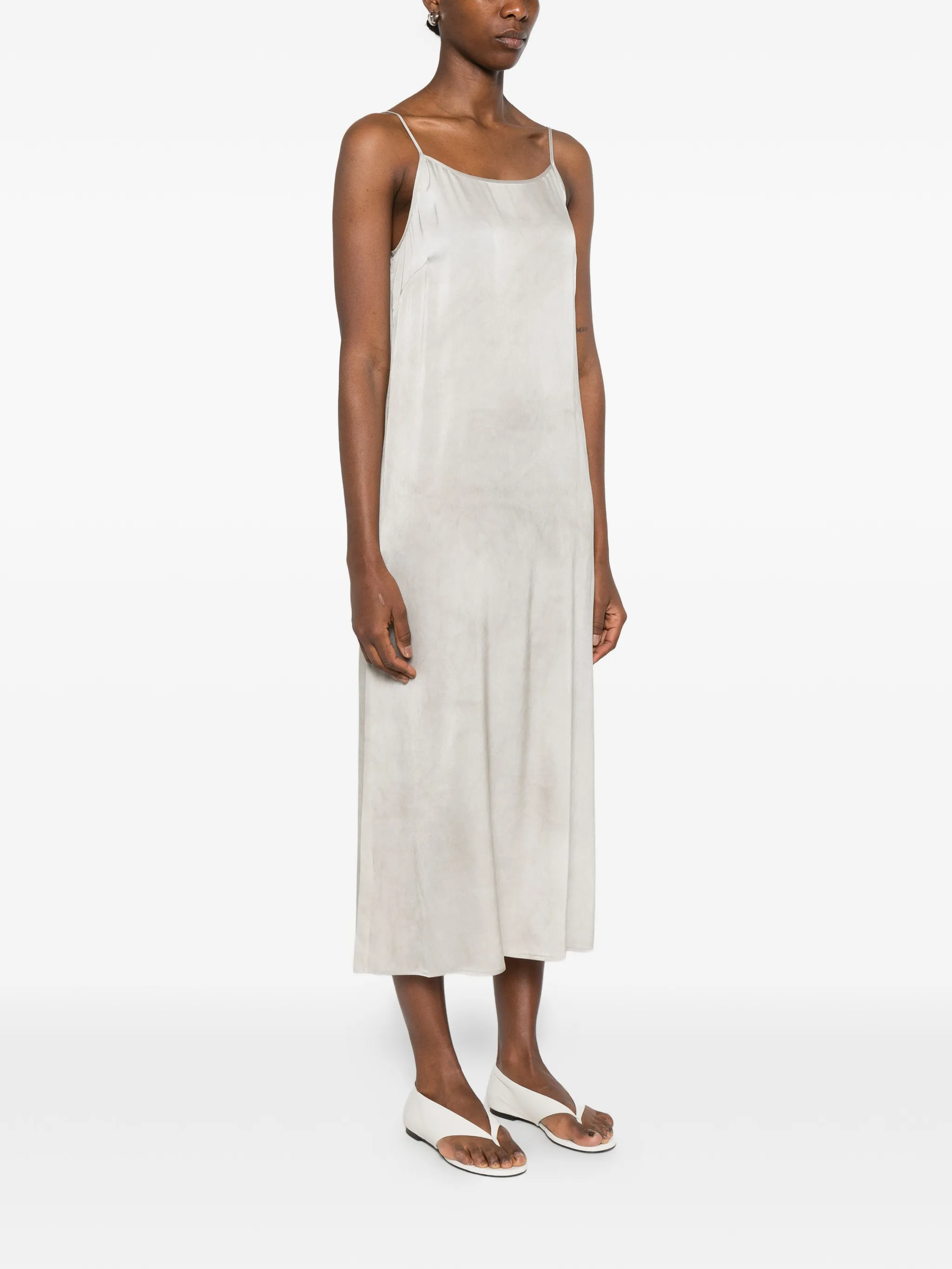 White dress worn by a person, showing the dress fit