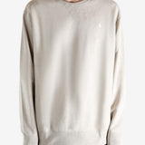 Tan shirts worn by a person, showing the shirts fit