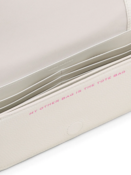 Close up of white bag,showing texture of the leather fabric