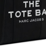 Close up of the black bag, showing texture of the cotton fabric