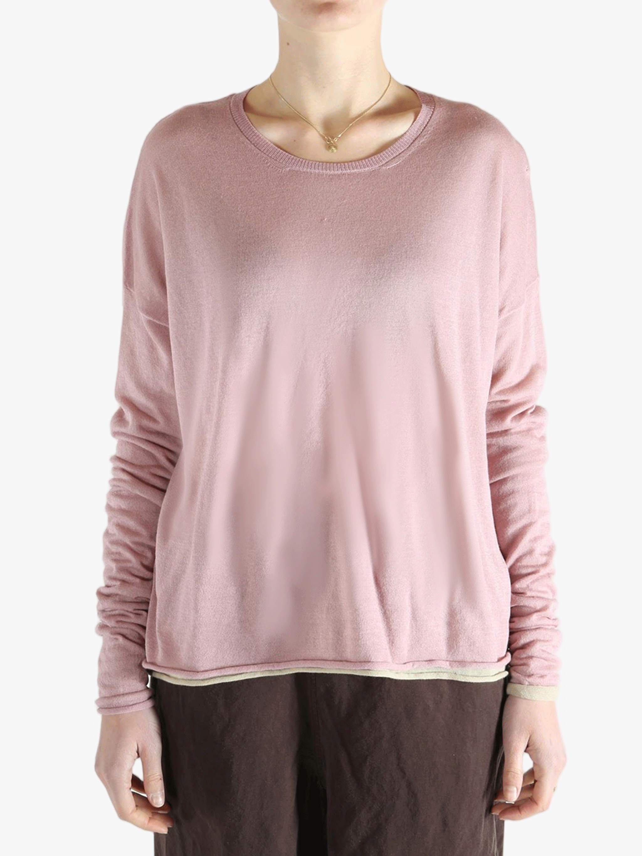 Pink top worn by a person, showing the top fit