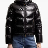 Black jacket worn by a person, showing the jacket fit