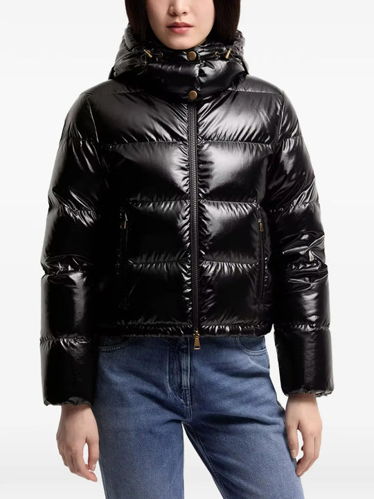 Black jacket worn by a person, showing the jacket fit