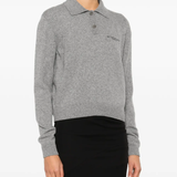 grey shirt worn by a person, showing the shirt fit