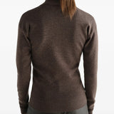 Brown top worn by a person, showing the top fit
