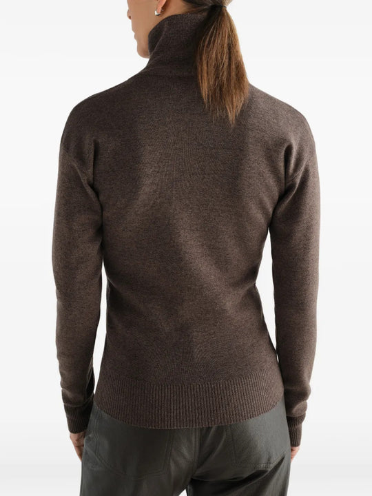 Brown top worn by a person, showing the top fit