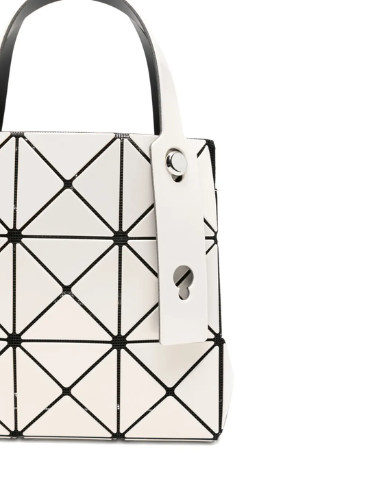 Close up of white bag, showing texture of the nylon fabric