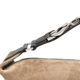 close up of brown bags, showing texture of the calf suede fabric