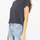 black t-shirt worn by a person, showing the t-shirt fit