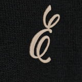 Close up of black sweater, showing texture of the Acrylic fabric