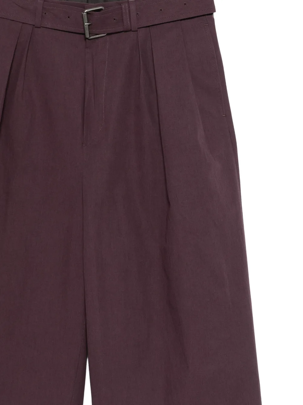 close up of brown pants, showing texture of the wool fabric