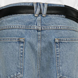 Blue pants worn by a person, showing the pants fit