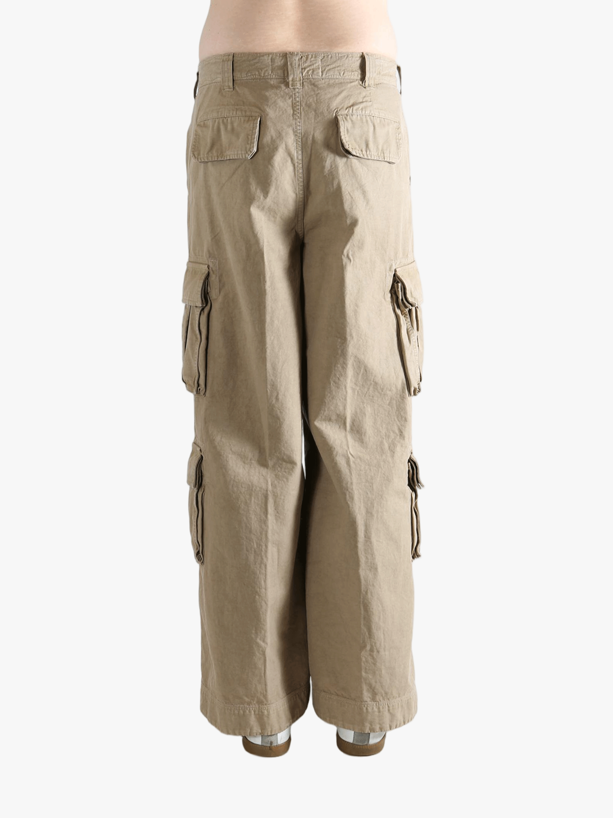 Brown pants worn by a person, showing the pants' fit