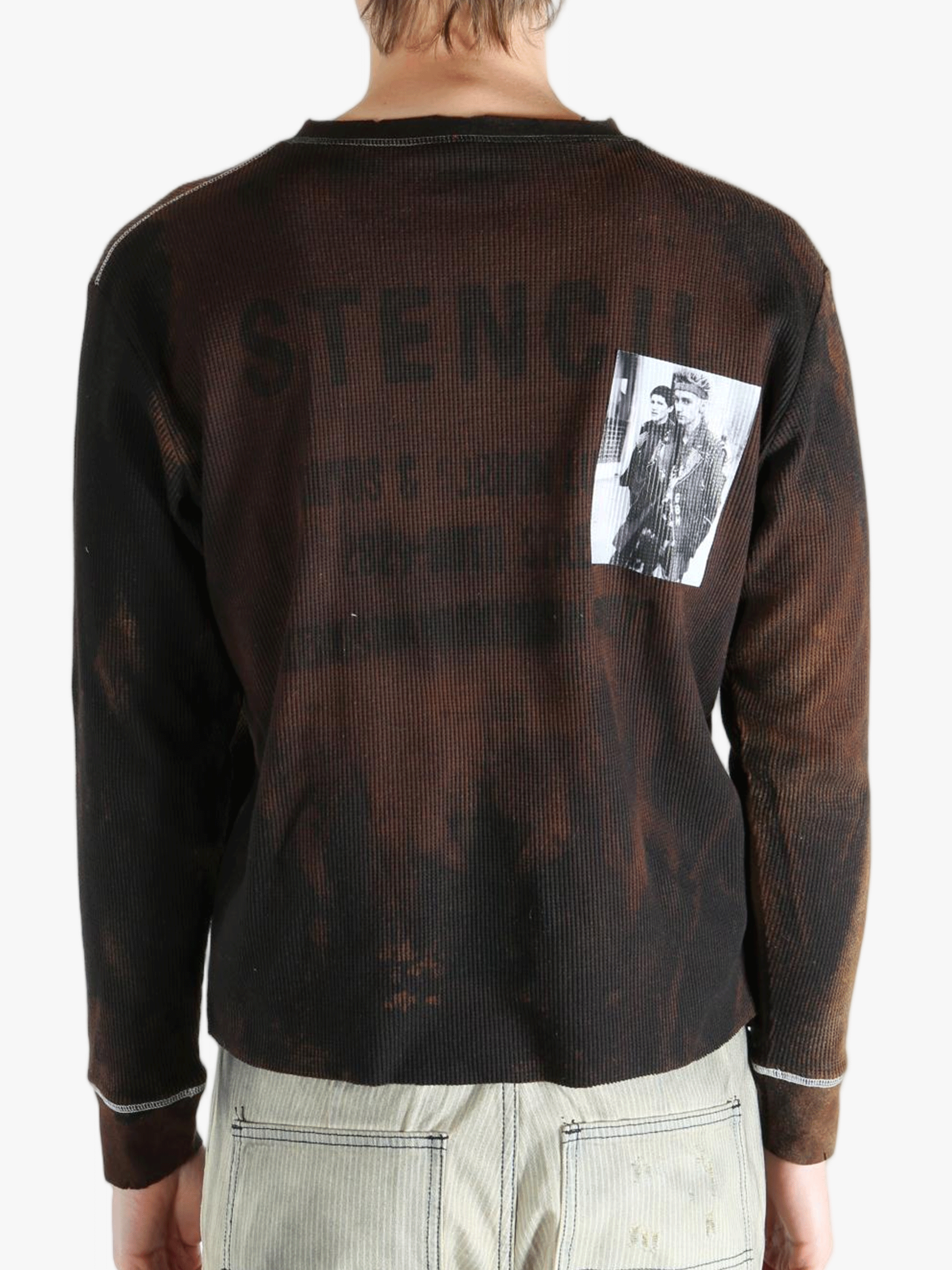 Brown shirts worn by a person, showing the shirts fit