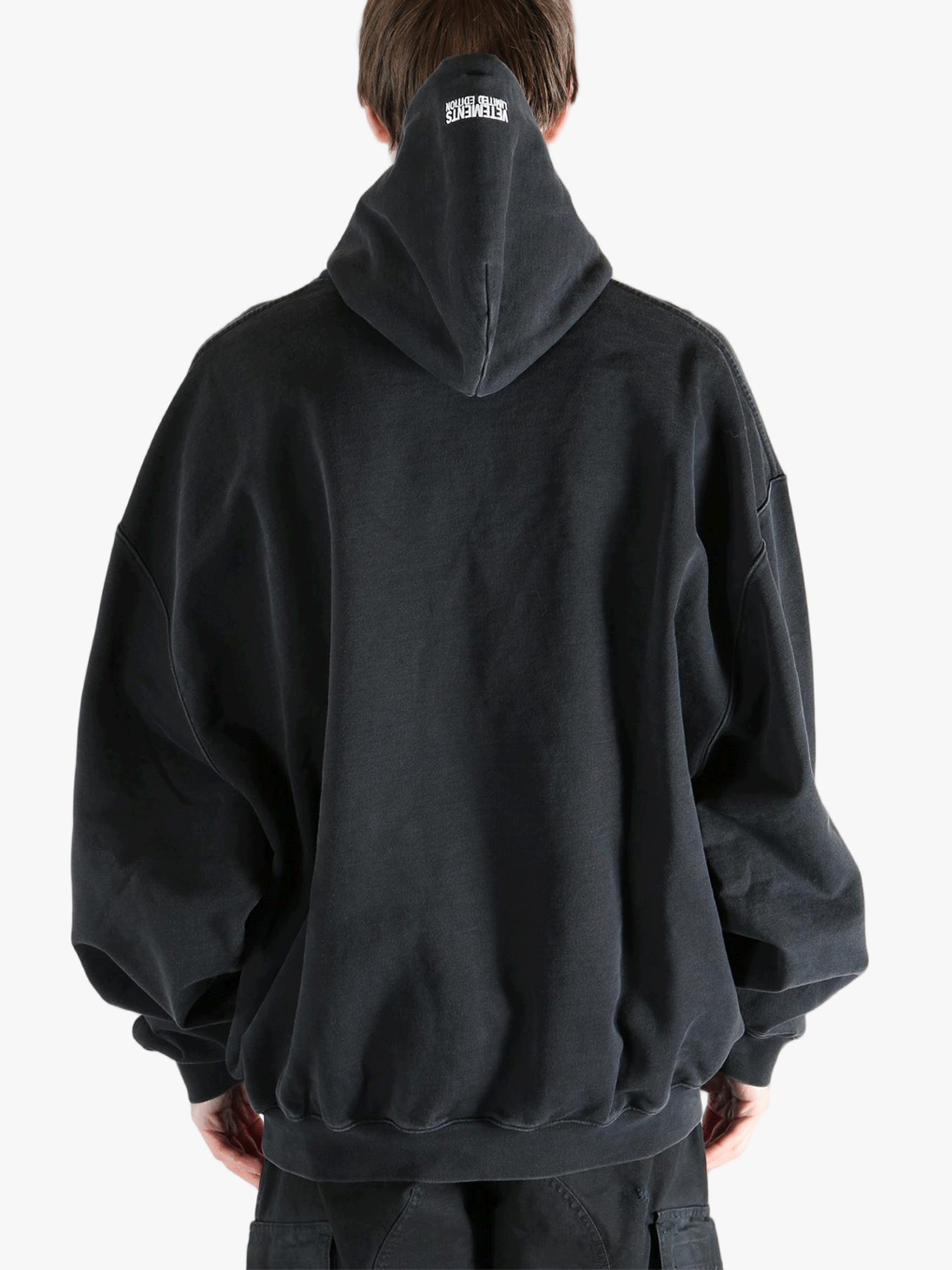 Black sweats-hoodies worn by a person, showing the fit