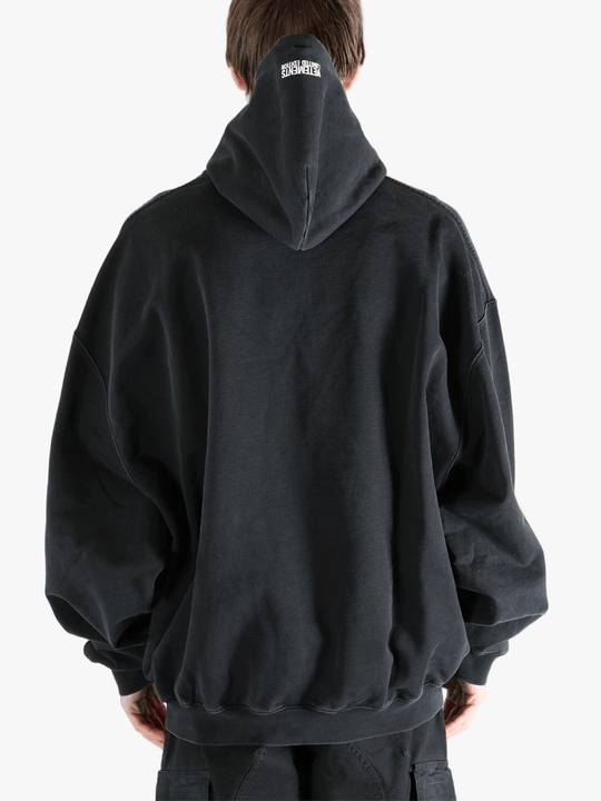 Black sweats-hoodies worn by a person, showing the fit