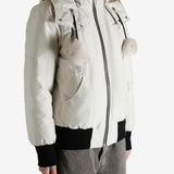 White bomber worn by a person, showing the bomber fit