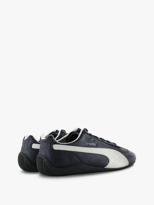 Navy shoes, side view
