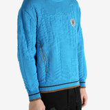 Blue jumper worn by a person, showing the jumper's fit
