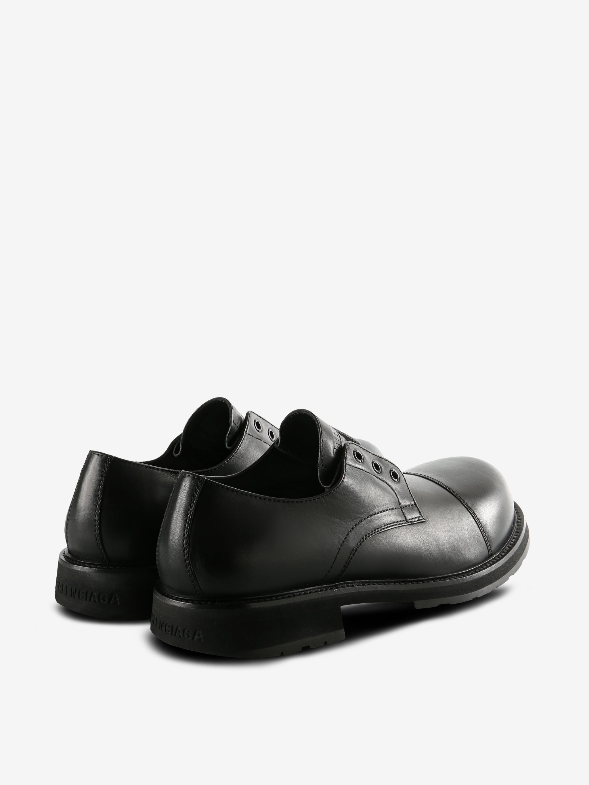Black derbys, back view