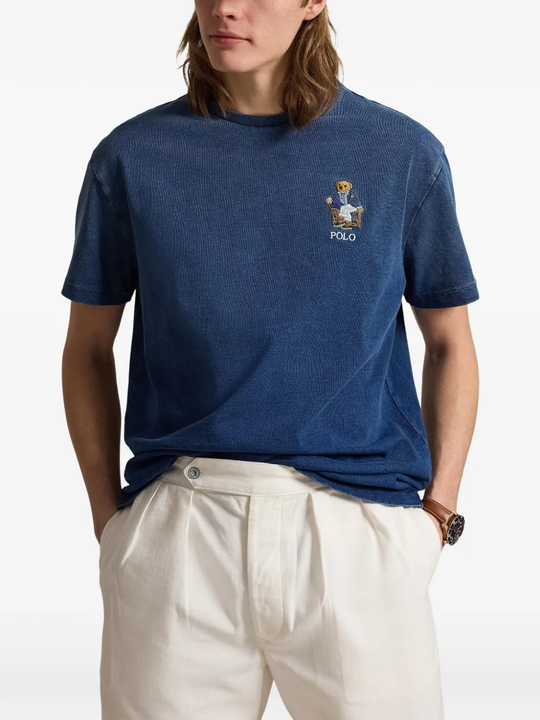 Blue t-shirt worn by a person, showing the t-shirt fit