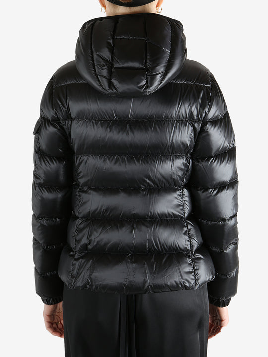 Black jackets-coats worn by a person, showing the jackets-coats fit