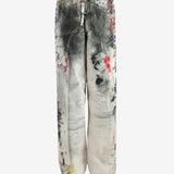 White pants worn by a person, showing the pants's fit