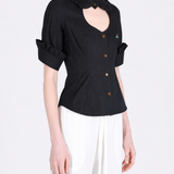 Black shirt worn by a person, showing the shirt fit