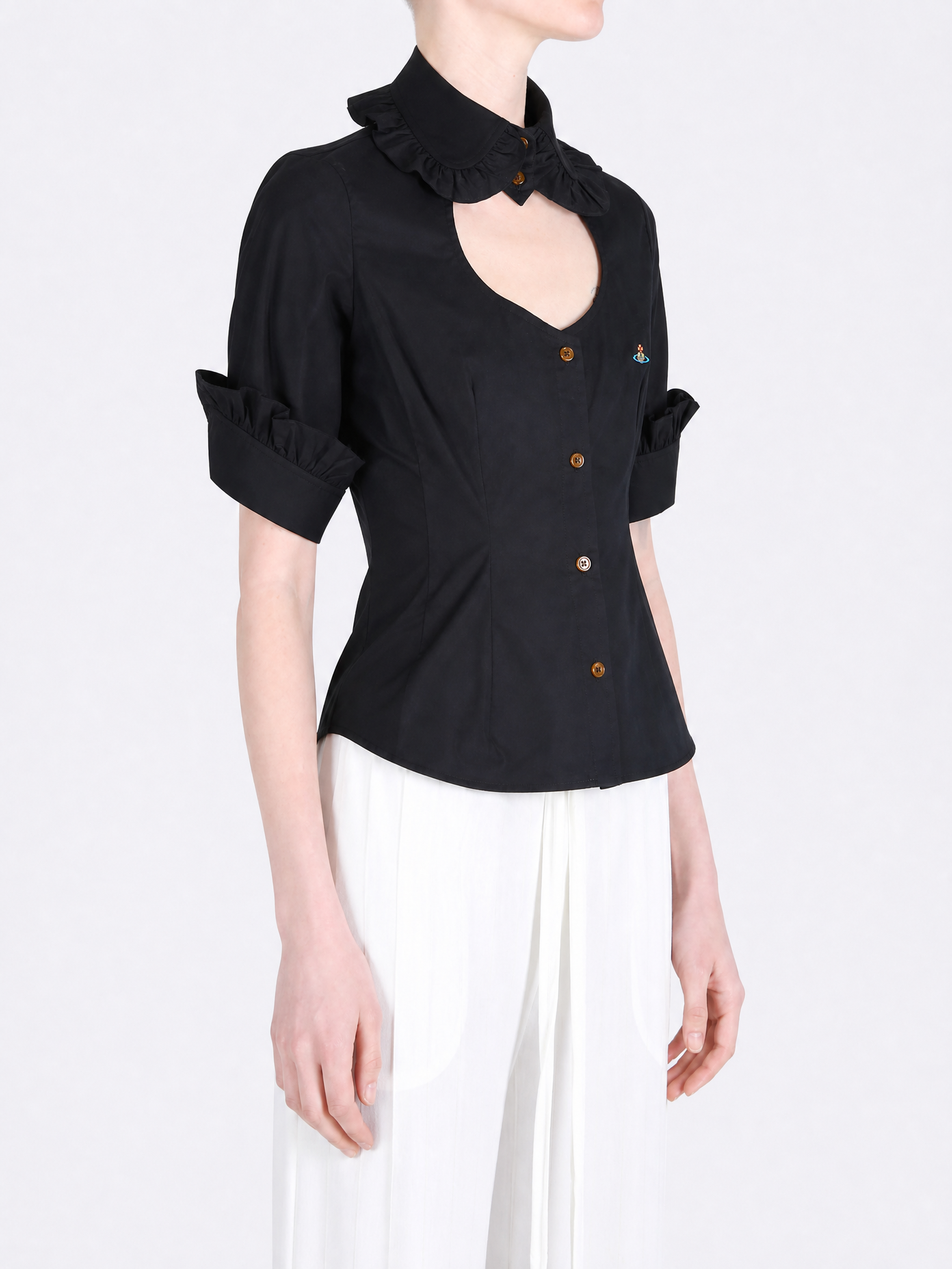 Black shirt worn by a person, showing the shirt fit