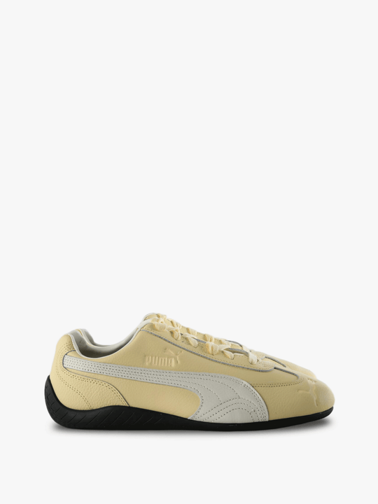 Tan shoes, side view