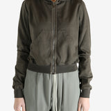 Grey sweats-hoodies worn by a person, showing the sweats-hoodies fit