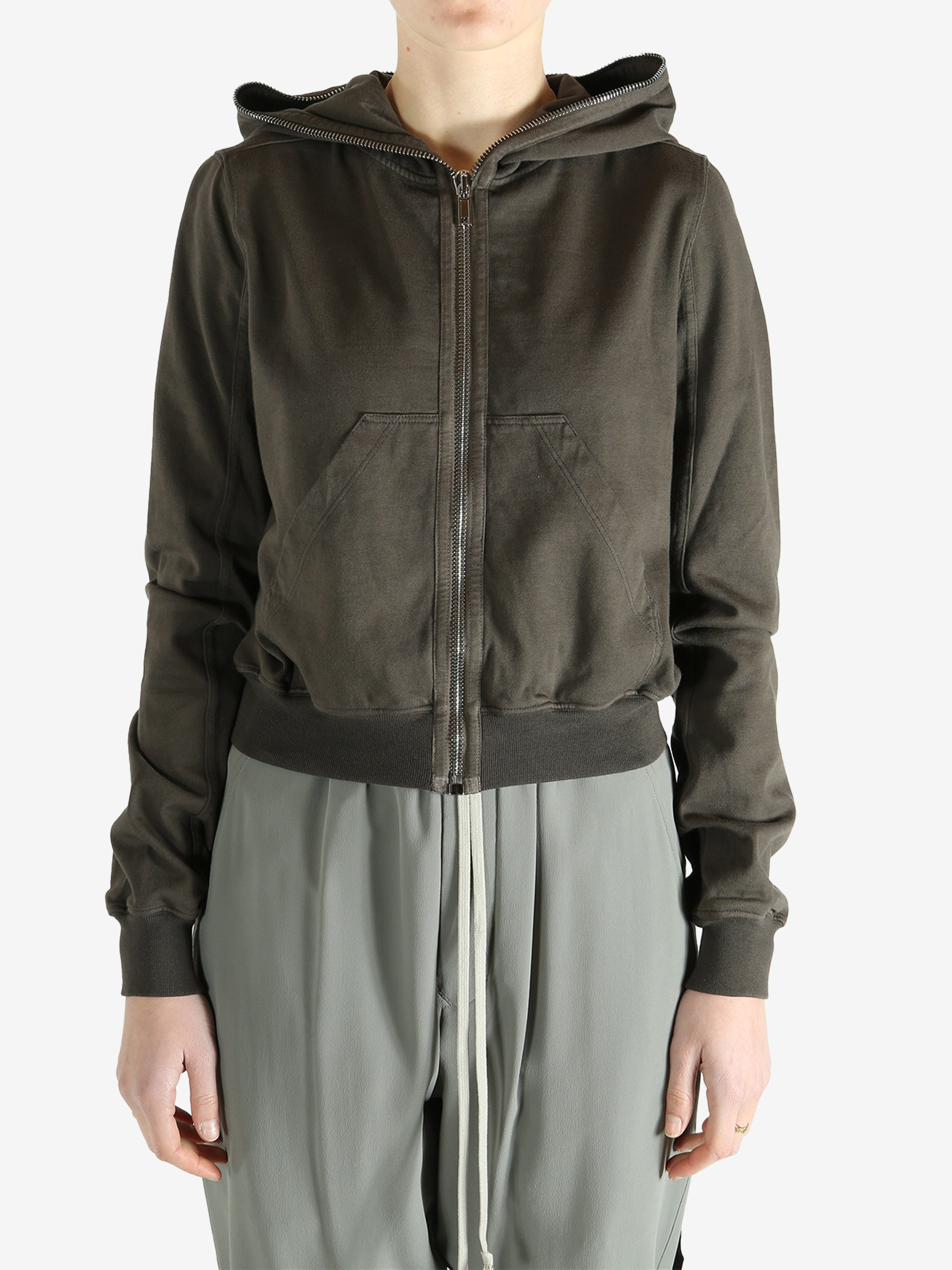 Grey sweats-hoodies worn by a person, showing the sweats-hoodies fit