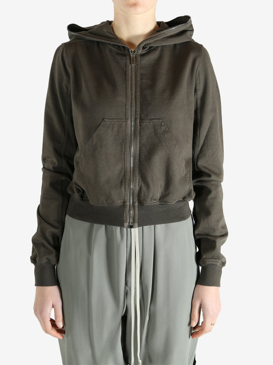 Grey sweats-hoodies worn by a person, showing the sweats-hoodies fit