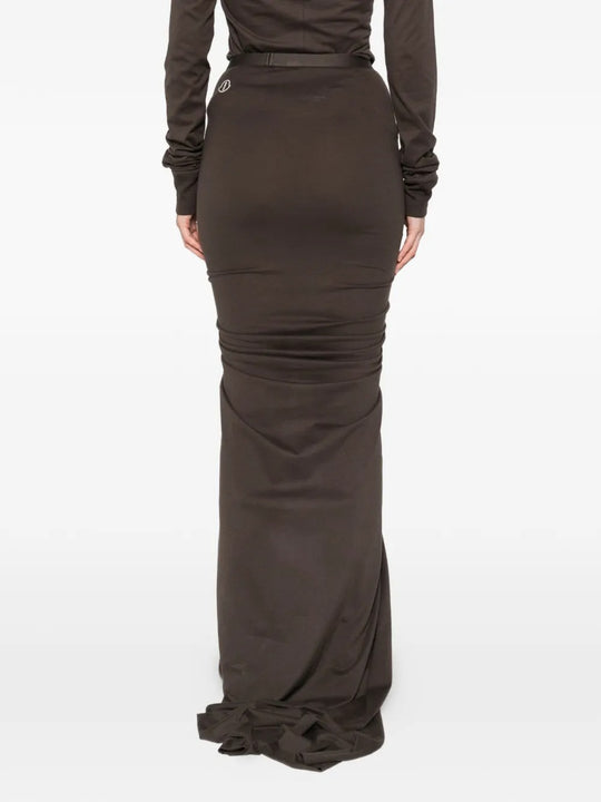 Brown skirts worn by a person, showing the skirts fit